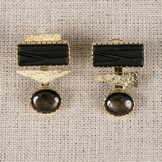 Earrings: Carved Onyx, Black Star Sapphire, tufa cast gold